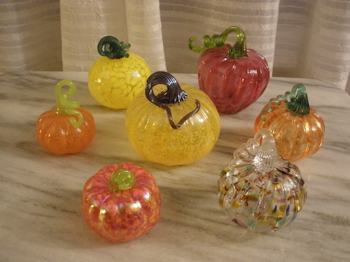 seven colorful glass pumpkins